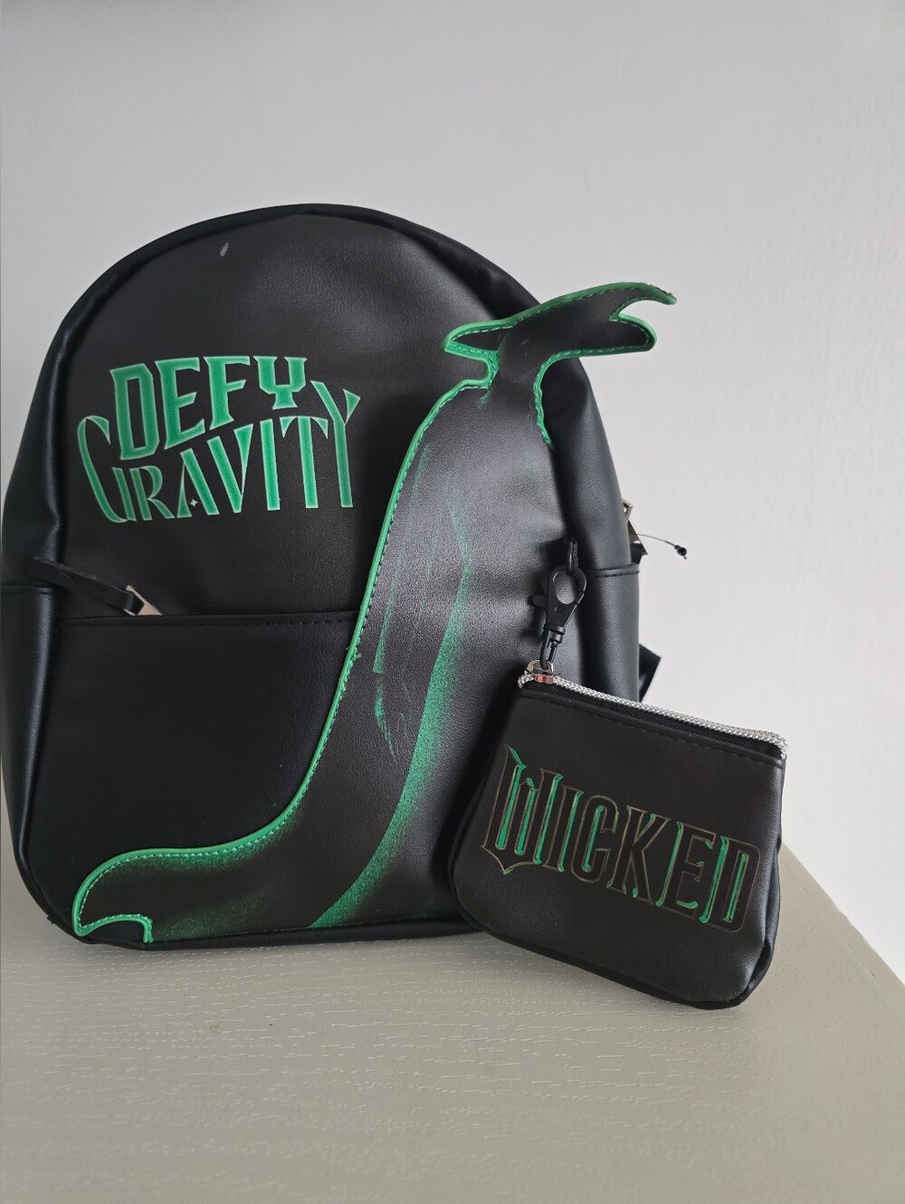 Wicked Defy Black & Green 'Defy Gravity' Men's Backpack with 'Wicked' Coin Pouch
